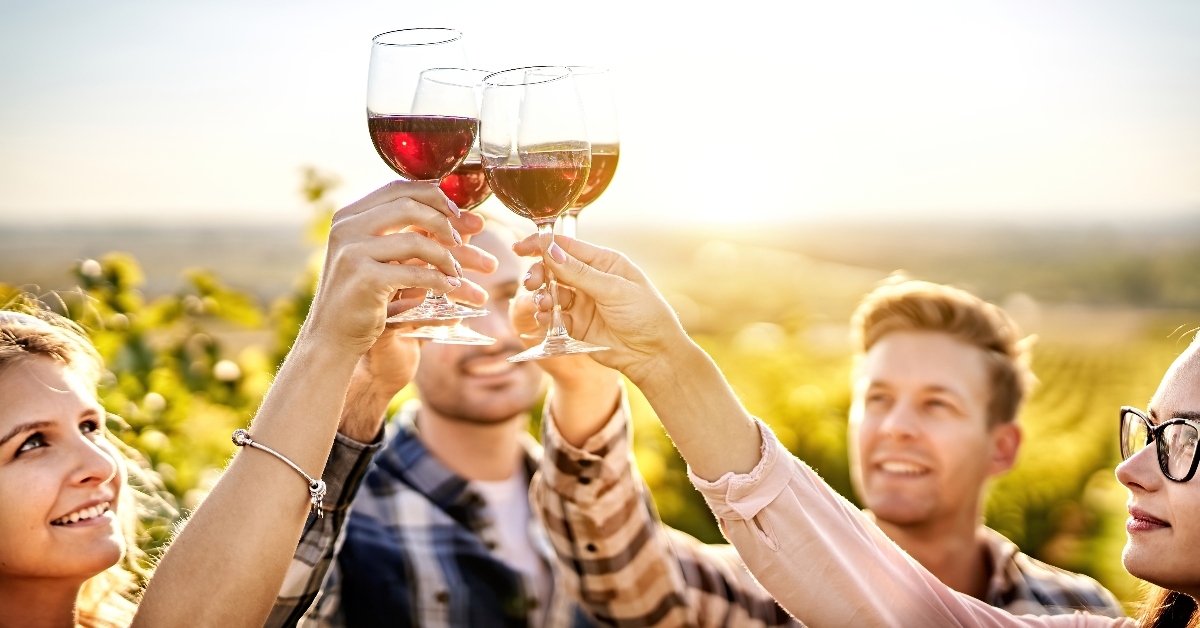 People tasting wine