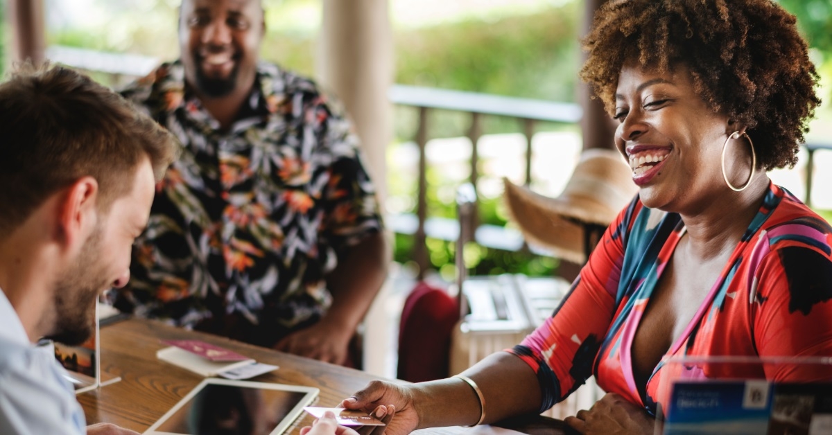 Couple checking in to a hotel