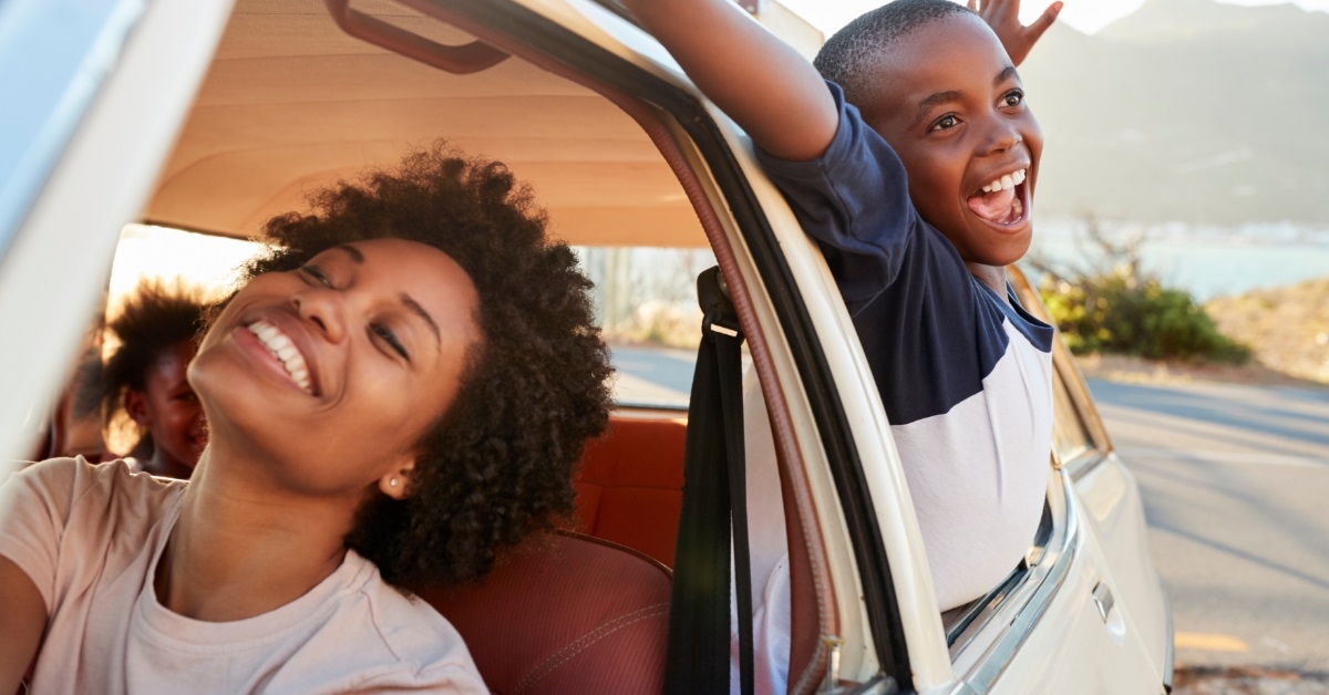 Happy family in a car