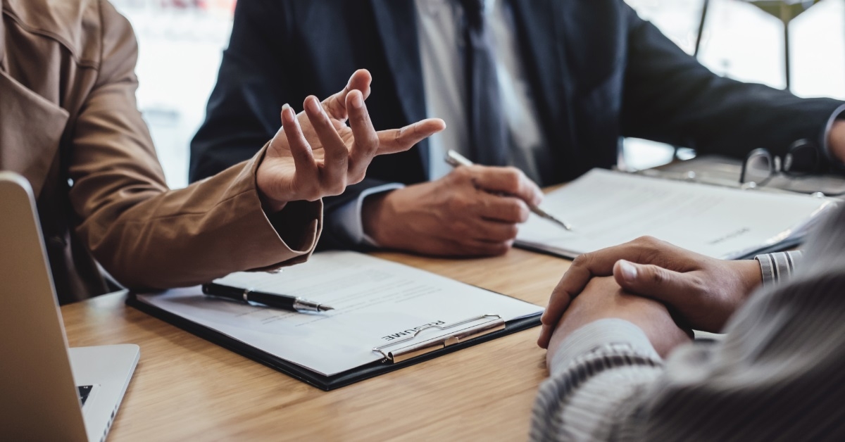 business men having interview with candidate