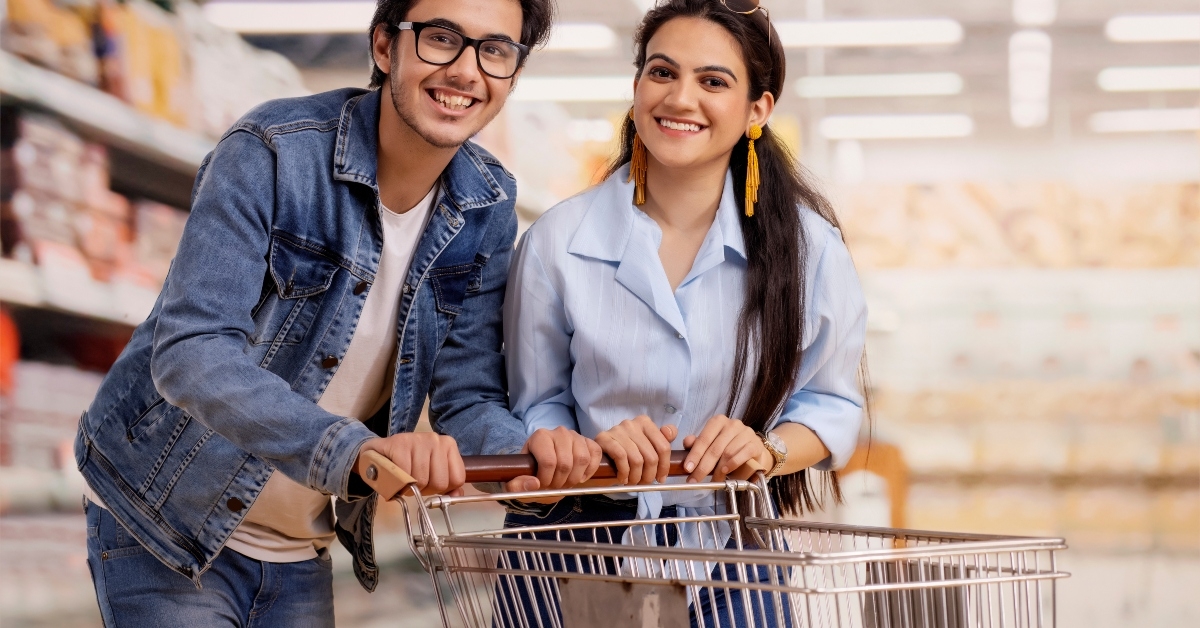 Happy couple with cart
