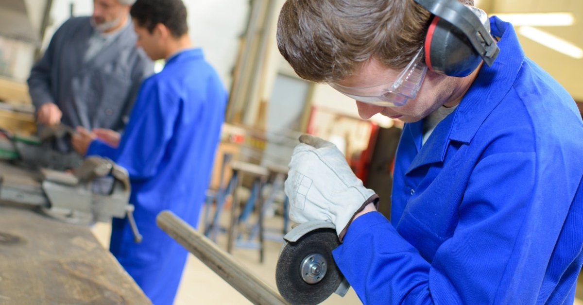 young technician practicing at craft class