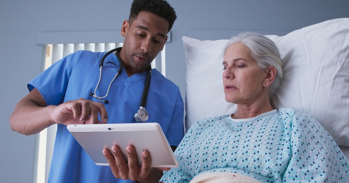 african-american RN and senior patient