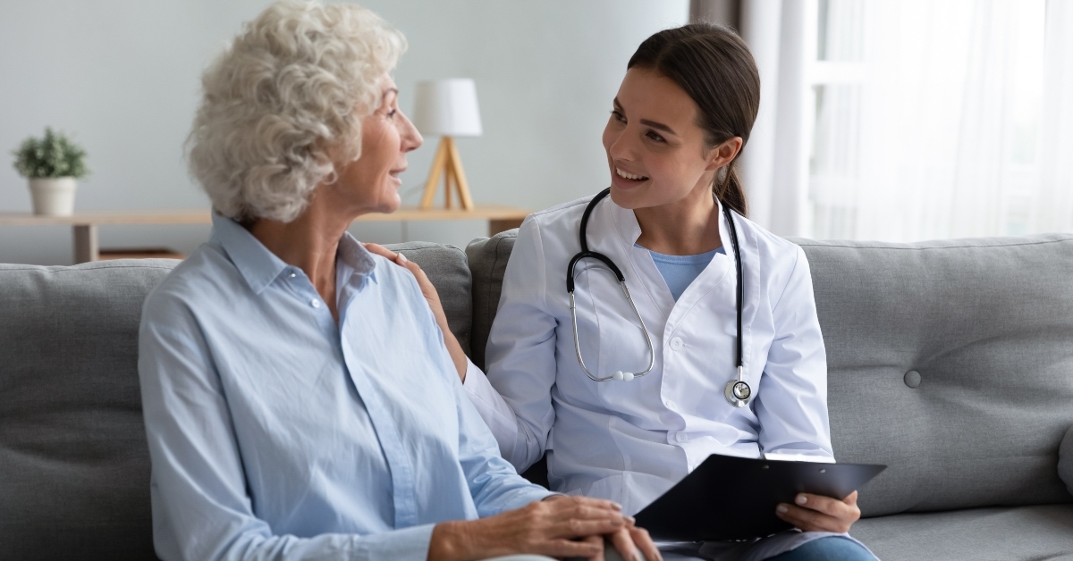 nurse helping supporting grandmother patient