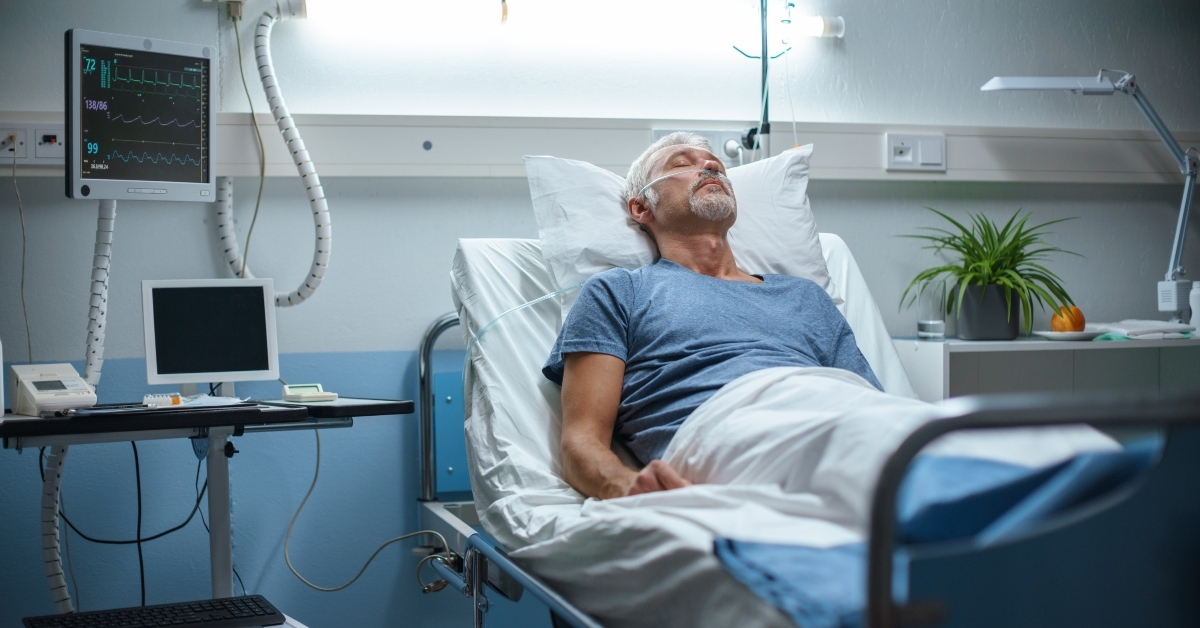 senior patient lying in bed
