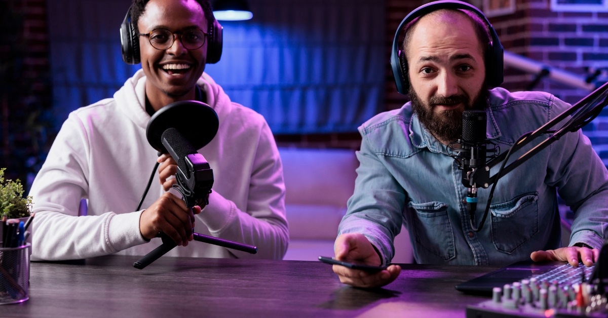 male influencers recording podcast in studio