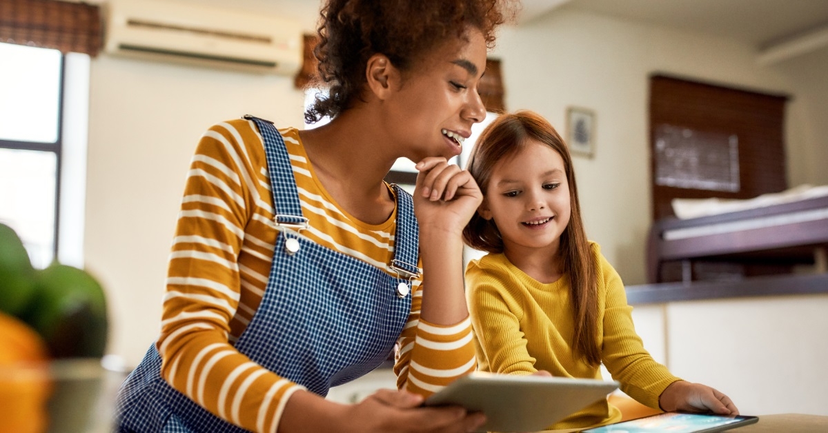 female babysitter talking to girl