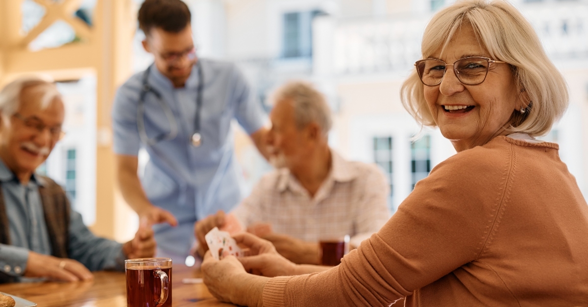 senior woman playing cards