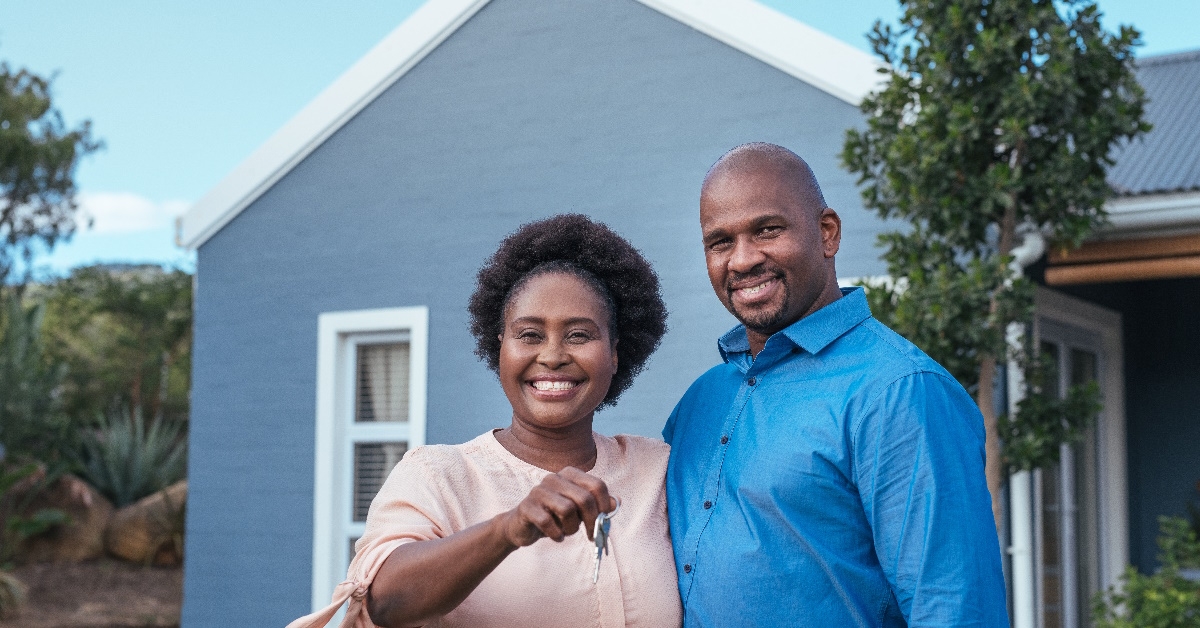 african american couple moving to house