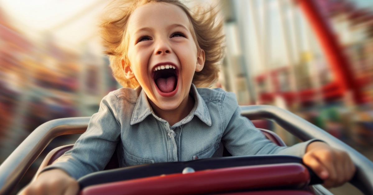 happy cute child on carousel