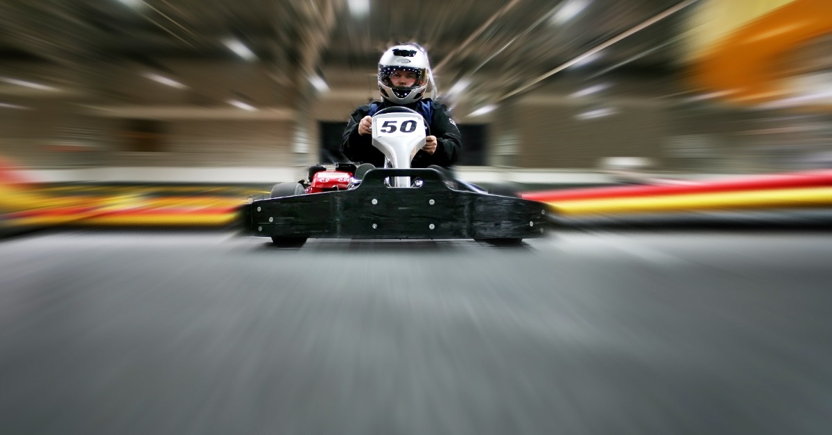 man enjoying go kart in park