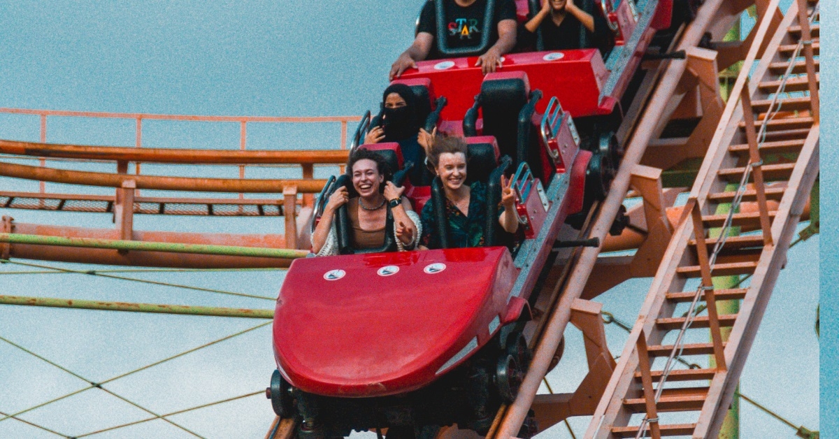 people enjoying roller coaster ride