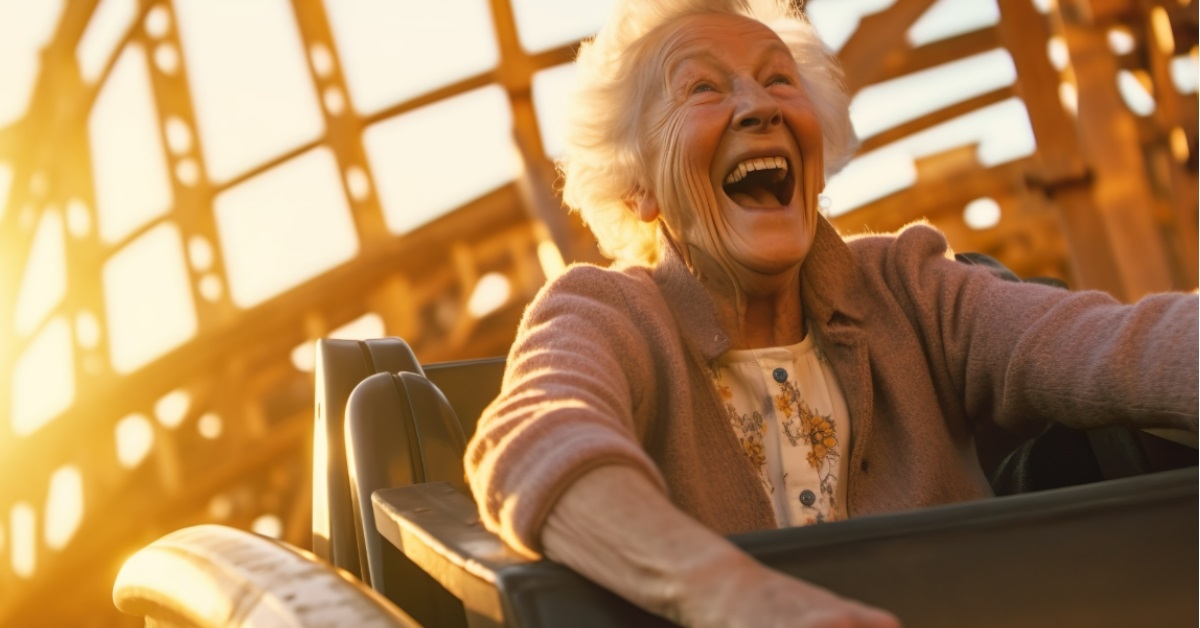 senior woman riding roller coaster