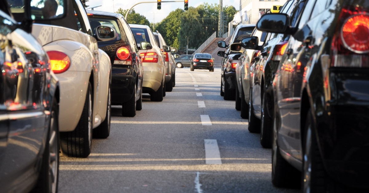 cars waiting at traffic signal