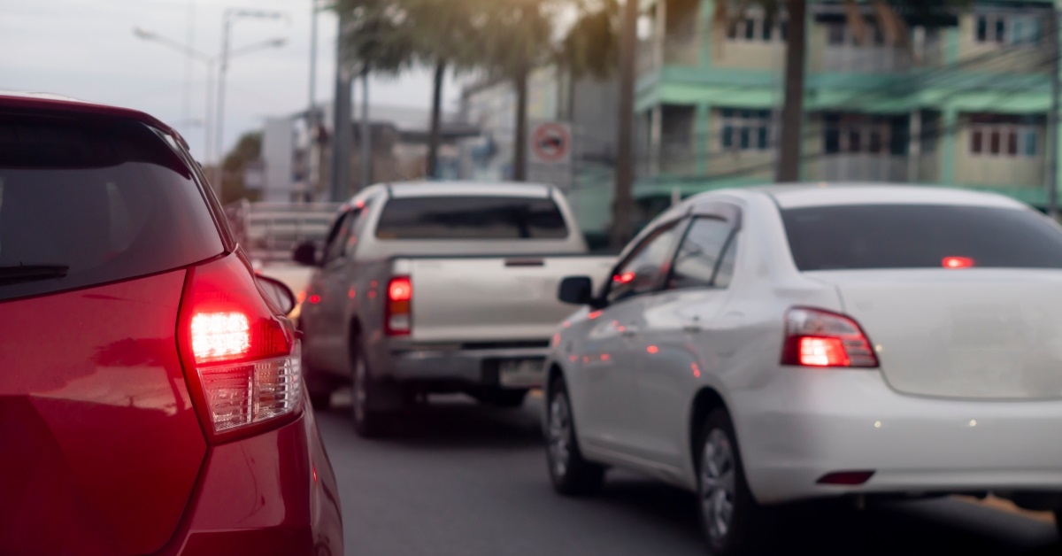 cars in traffic in evening