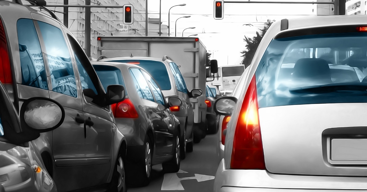 cars in jam packed city traffic