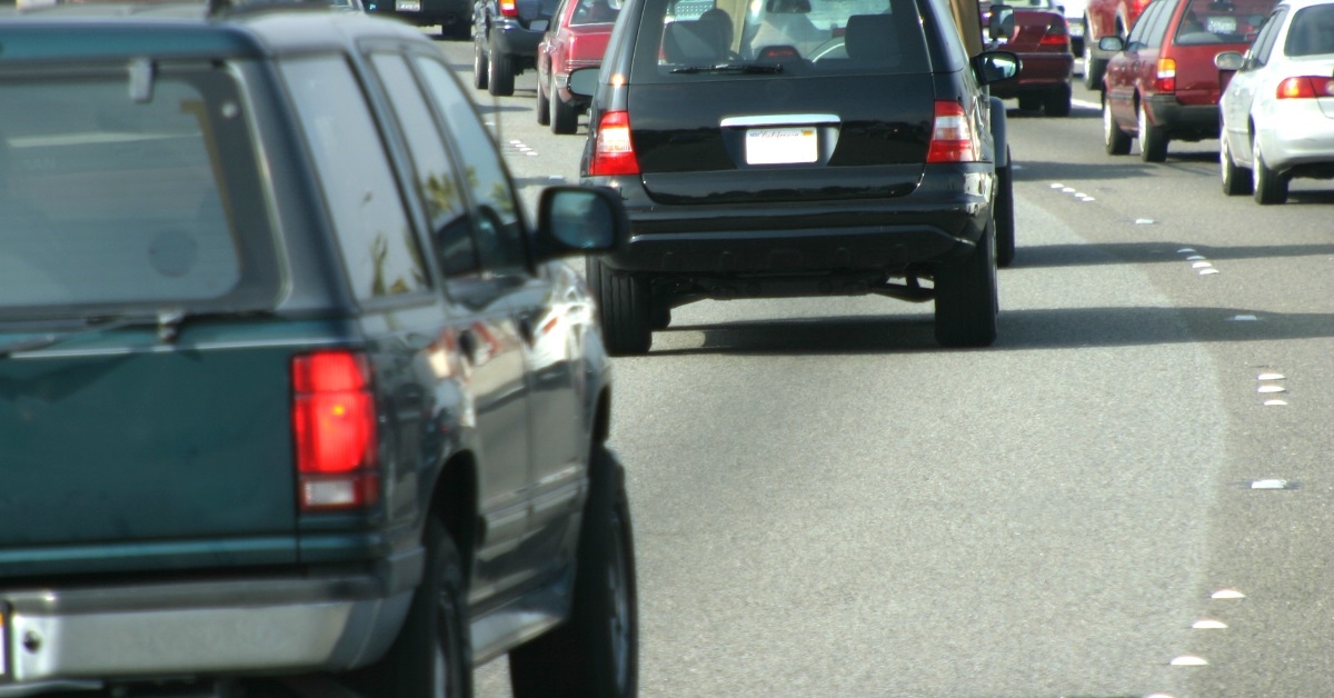 suv waiting in traffic during day