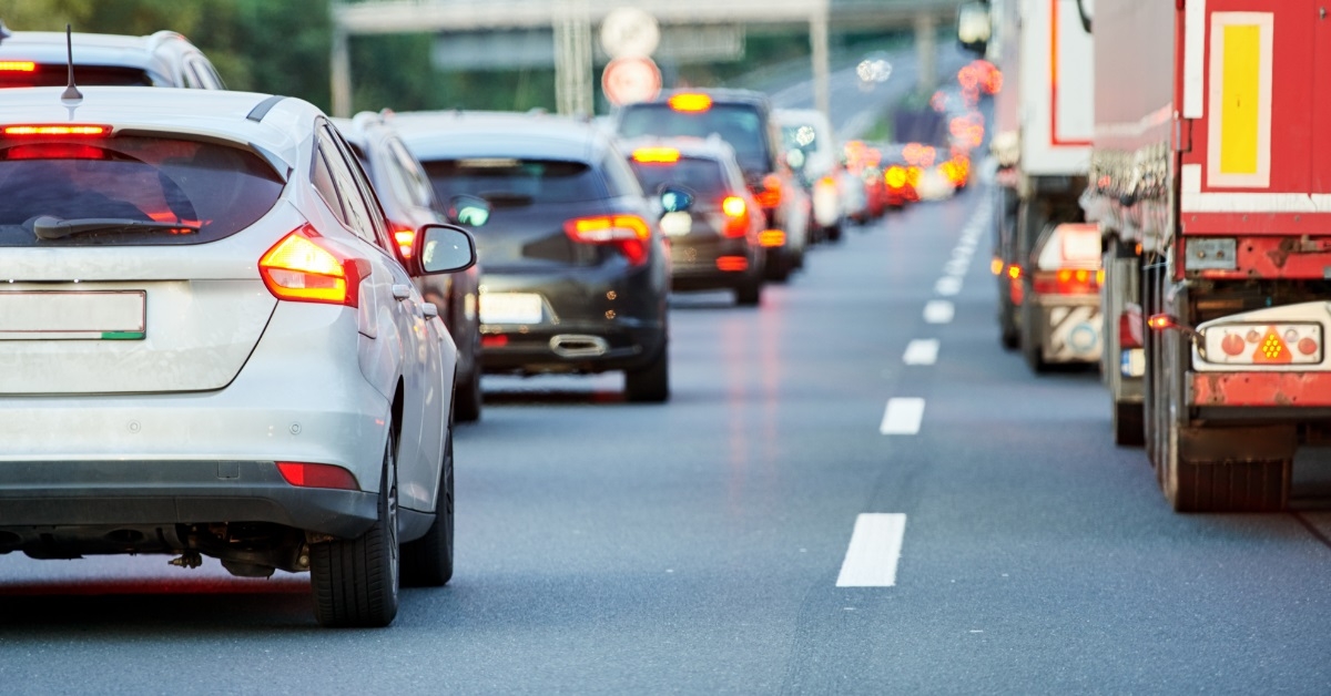 trucks and cars stuck in traffic