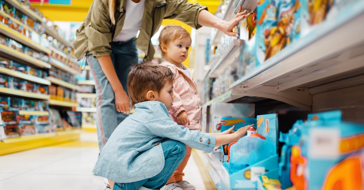 mother with her children at the store