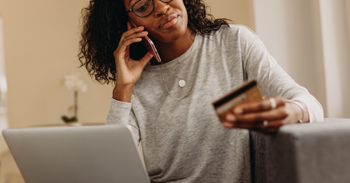 woman making online payments on call