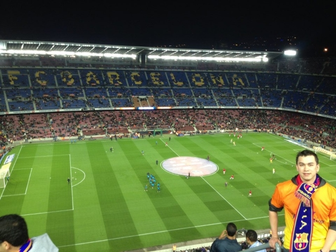A picture of the writer in the stands of a soccer game