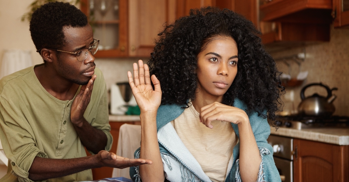 man in glasses offering hand