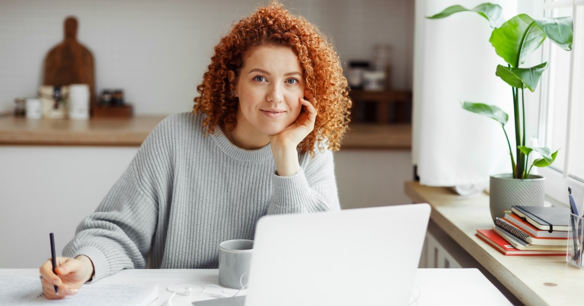 female freelancer working using laptop