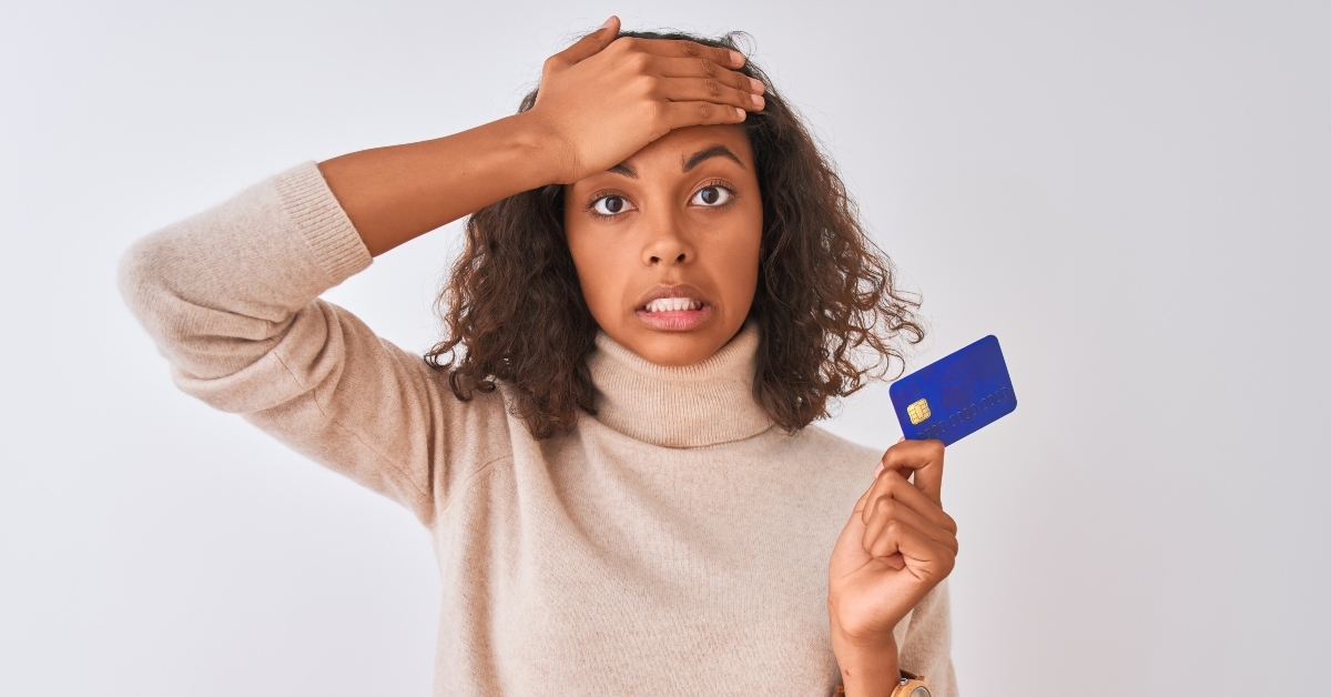 woman holding credit card