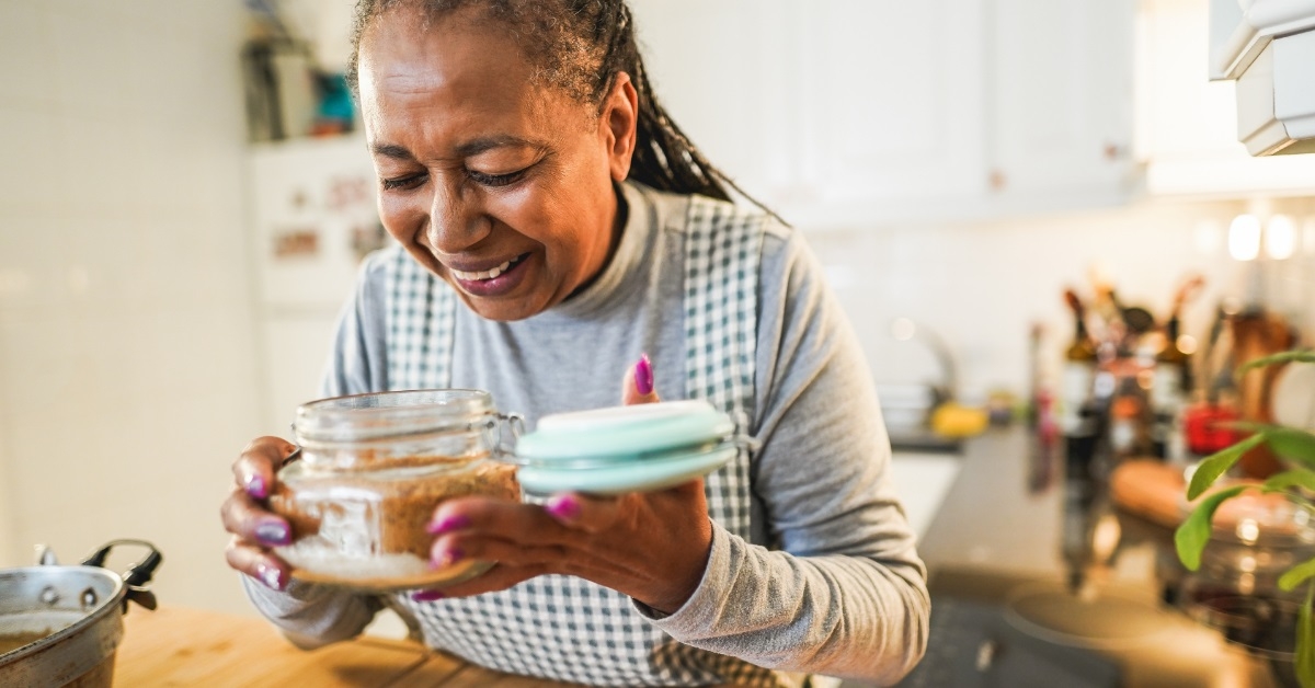 senior woman checking out kitchen ingredients