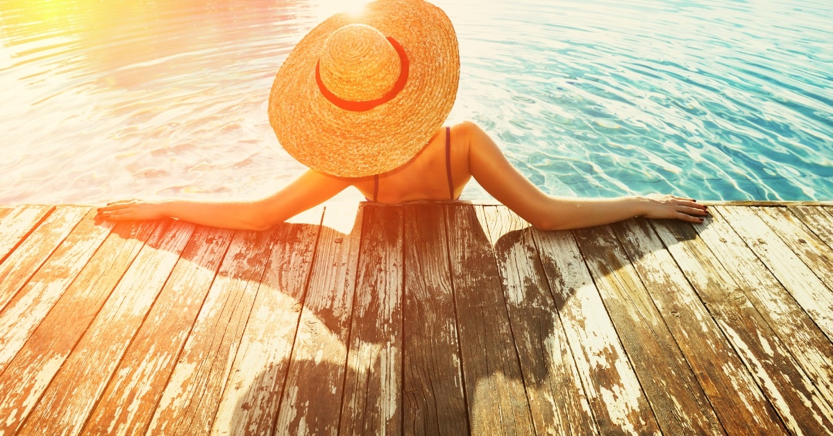 woman in pool on sunny day