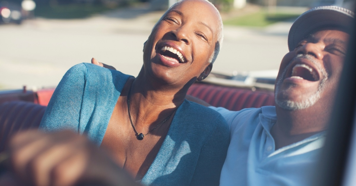 african american couple enjoying car ride