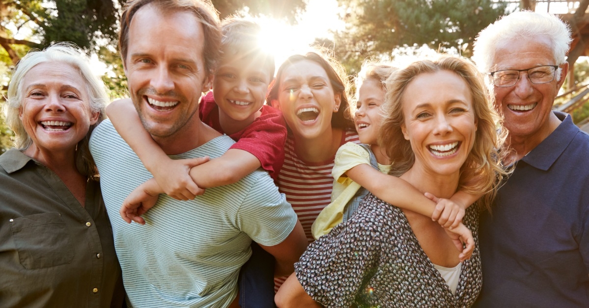 multi generation family enjoying in countryside
