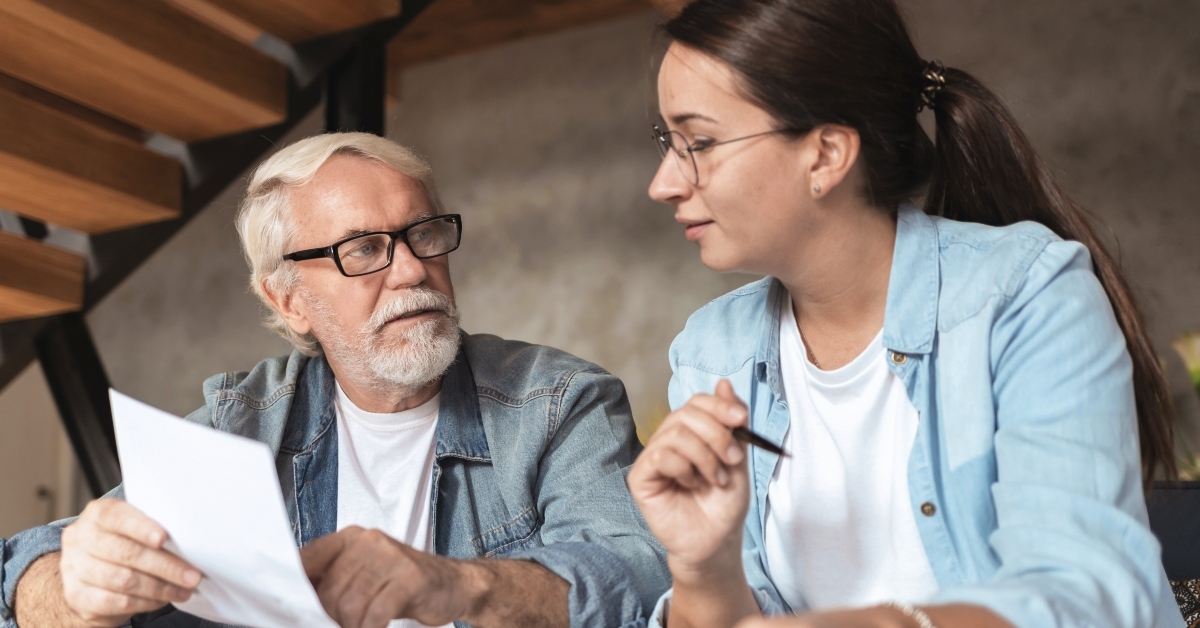 elderly man discussing the contract