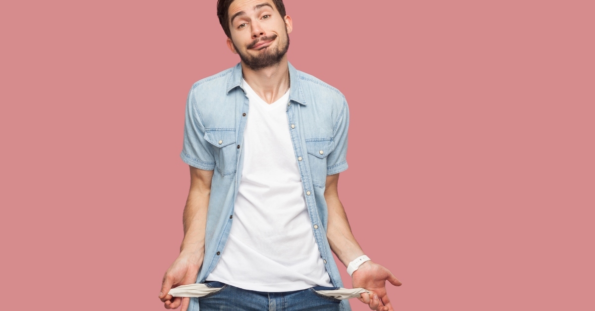 sad bankrupt bearded young man