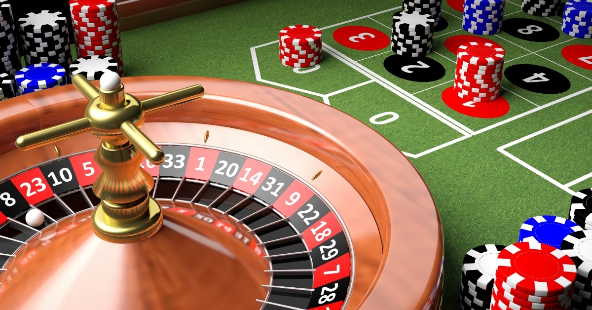 casino table with roulette and chips