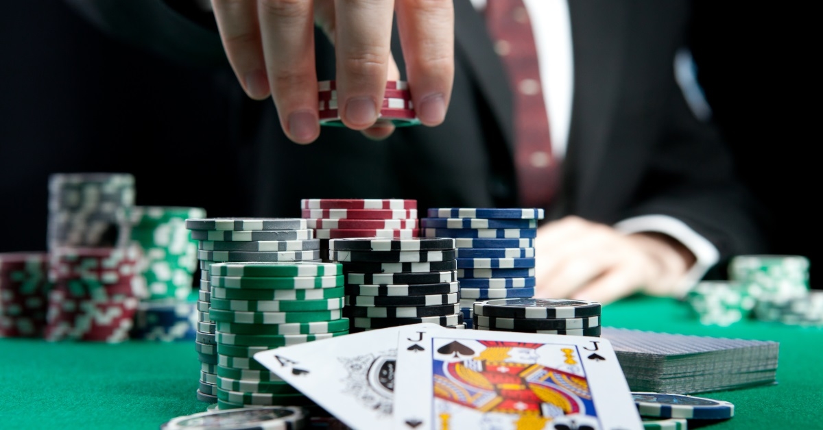 man making bet at casino