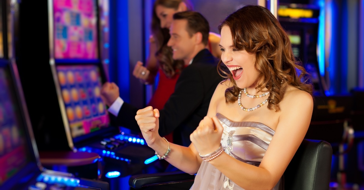 stylish woman cheering after winning bet