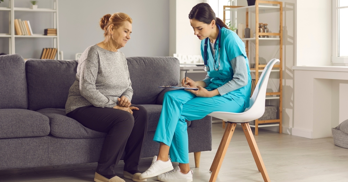 nurse listens to a health complaint