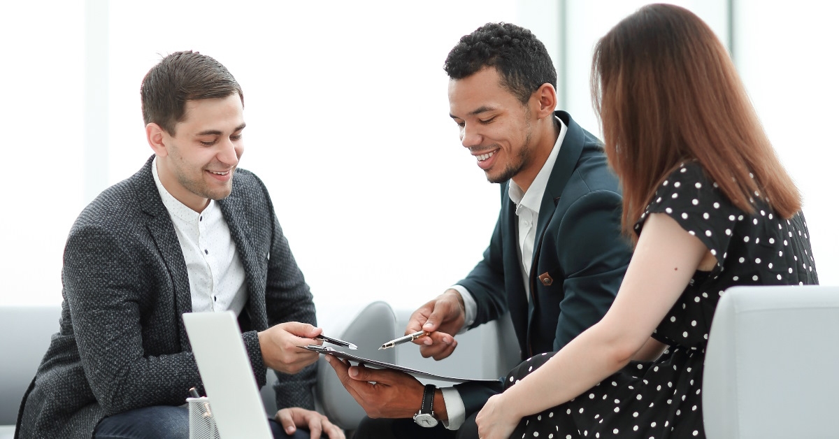 happy couple consulting finance advisor