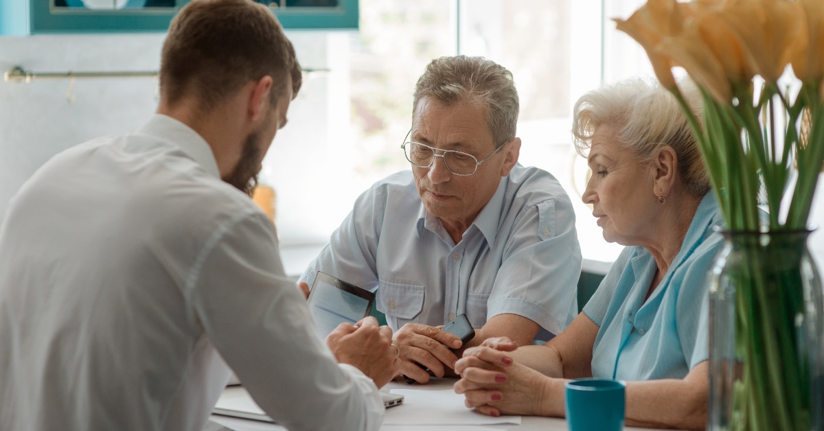 senior couple consulting finance advisor