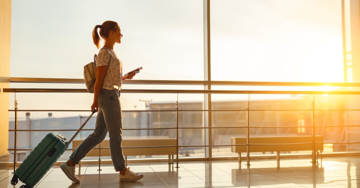young woman goes at airport
