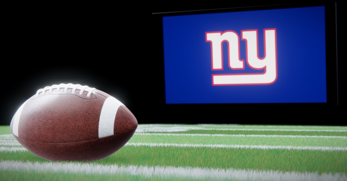 american football with new york giants logo