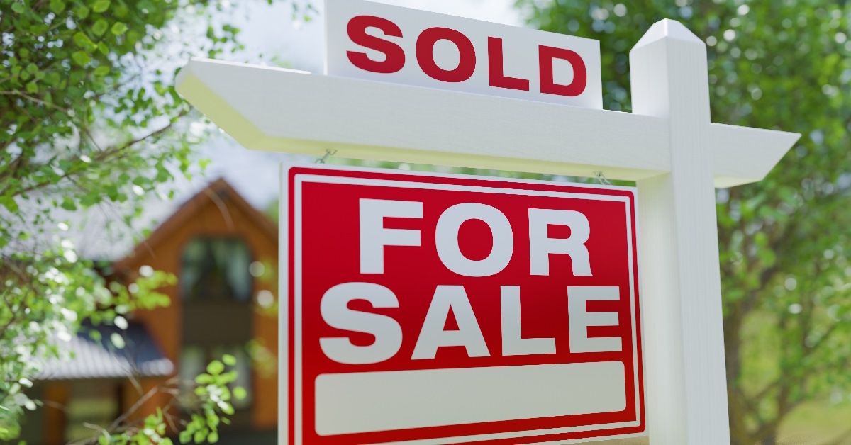 real estate sign that reads 