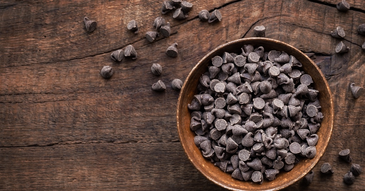 dark chocolate chips bowl on table