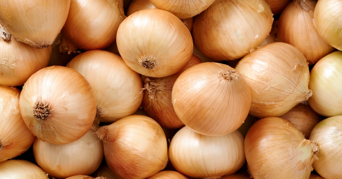 white onions stacked over each other