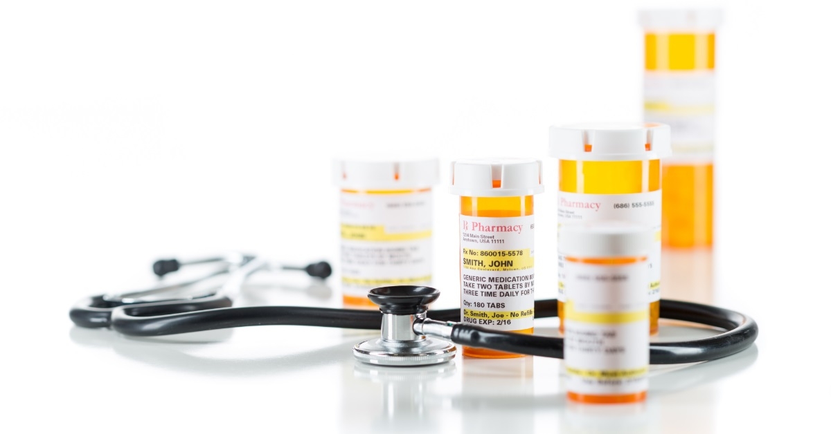 medicine prescription bottle with stethoscope