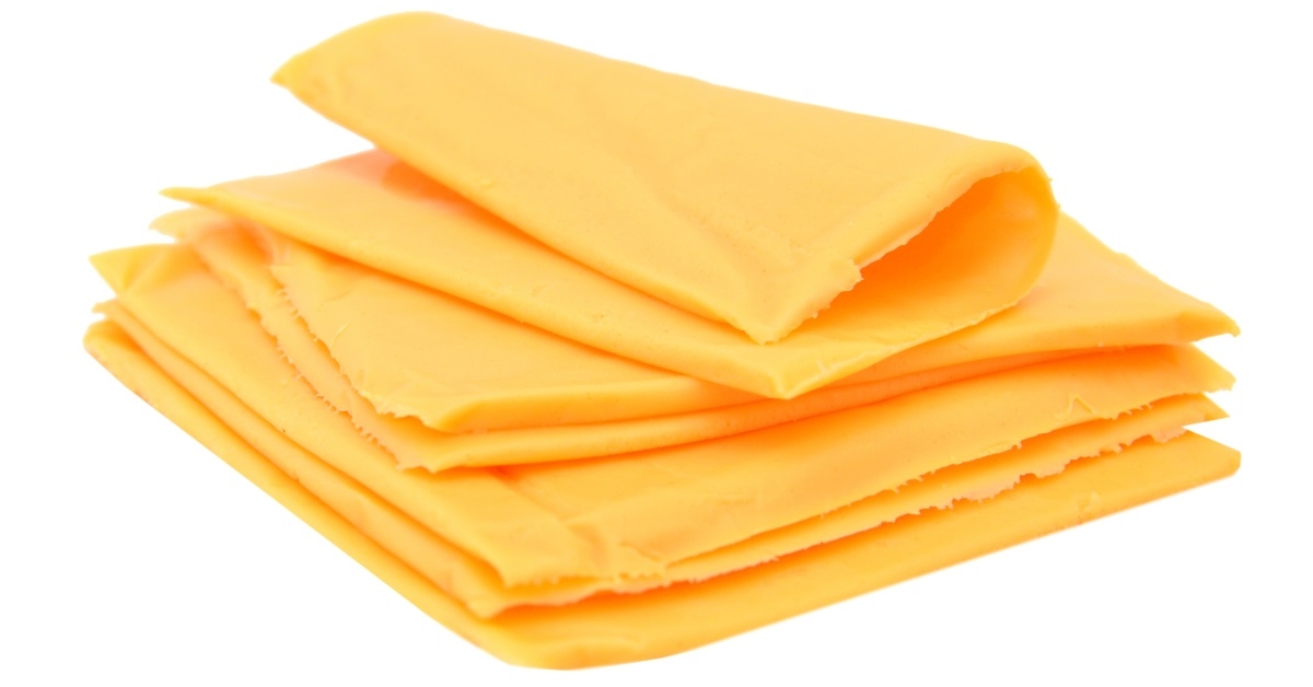 sliced cheese stack on white background