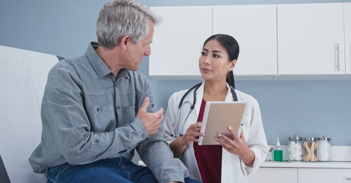 patient sitting on exam table