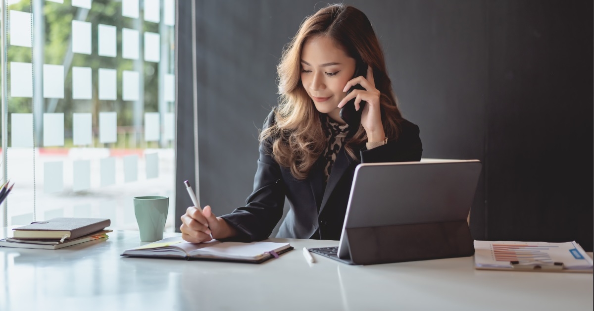 businesswoman on phone at work