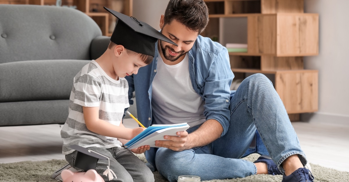 father teaching son at home